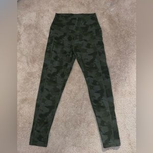 I am selling green camouflage leggings with pockets. They are a women’s medium.